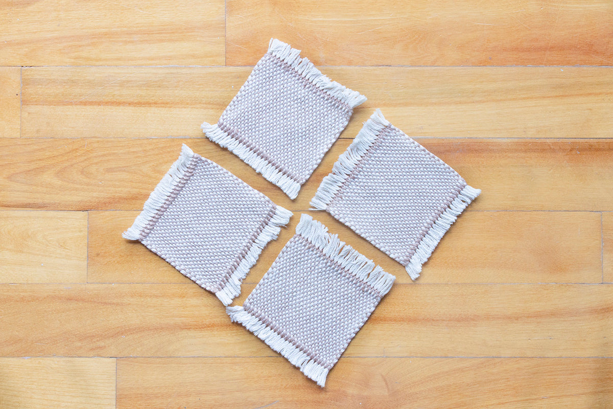 Cotton coasters, set of four, Pale Orange, Blue-grey, Brown, Bright Yellow, Bright Orange, Purple, handmade, natural fibres, hemstitched, made in Canada