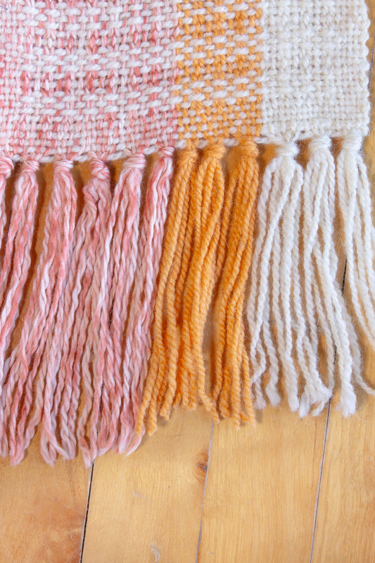 Wool scarf, orange striped window weave, white, undyed, marbled orange, handmade, natural fibres, Peruvian highland wool, local wool, virgin wool, locally sourced yarn, reclaimed loom waste, woven in Canada