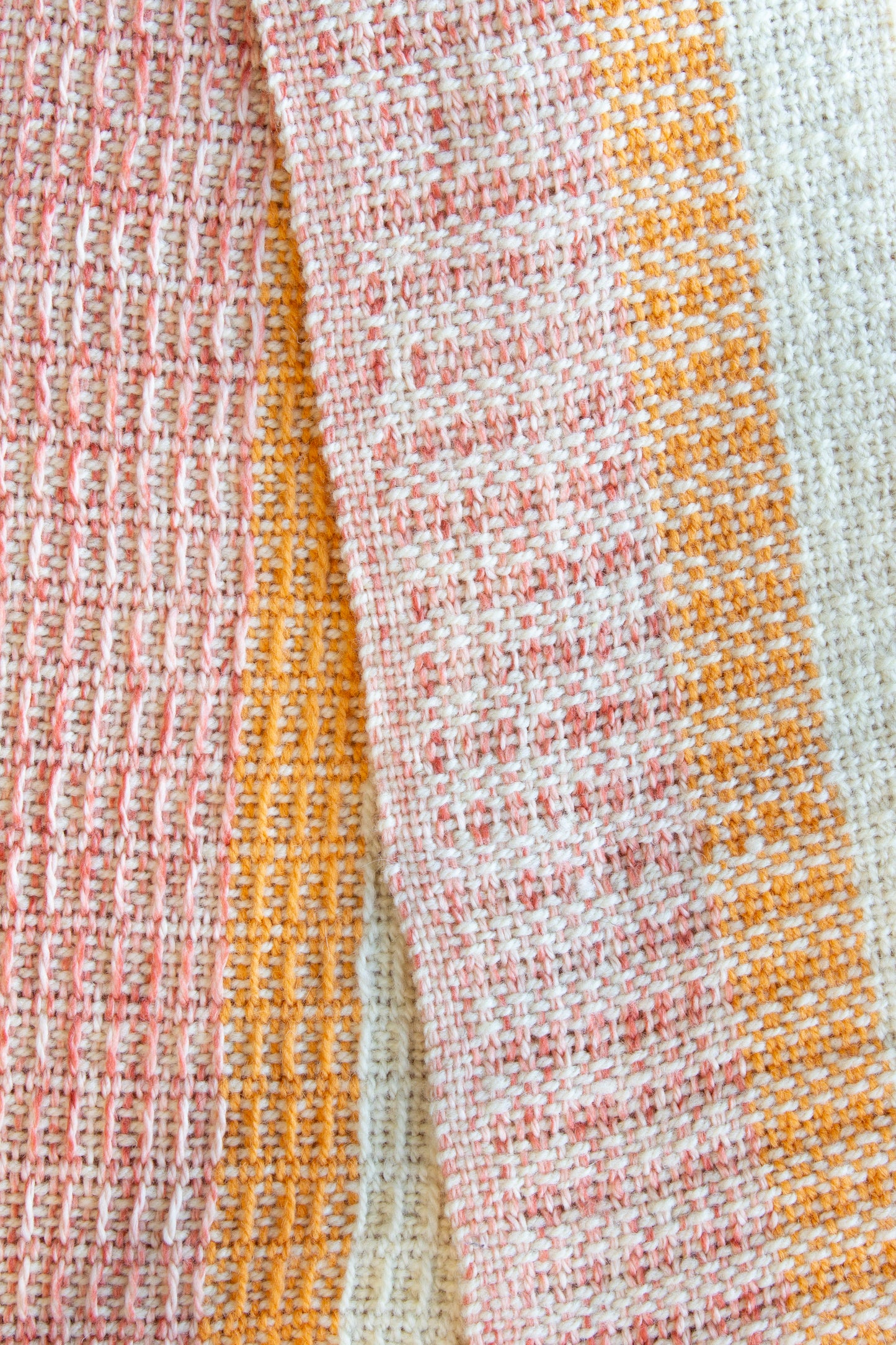 Wool scarf, orange striped window weave, white, undyed, marbled orange, handmade, natural fibres, Peruvian highland wool, local wool, virgin wool, locally sourced yarn, reclaimed loom waste, woven in Canada